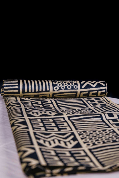 Tissu Comatex motif noir et beige avec des formes géométriques - Sougou Express