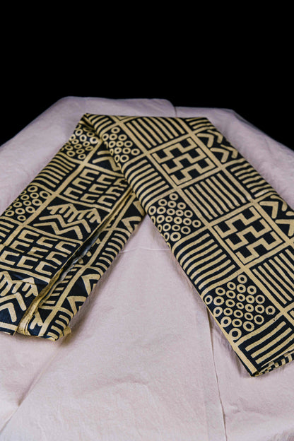 Tissu Comatex motif noir et beige avec des formes géométriques - Sougou Express